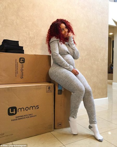 3549FB8000000578-3641963-She_posed_for_the_camera_perched_on_a_large_box_which_appeared_t-m-80_1465963288318