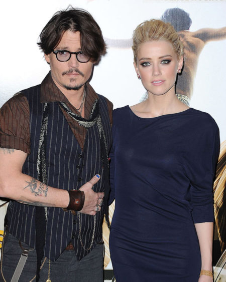 Johnny Depp and Amber Heard The Paris Premiere of 'The Rum Diary' held at Gaumont Marignan Paris,  France - 08.11.11 **Only available for publication in the Germany,  Austria,  Switzerland,  Portugal,  Canada,  United Arab Emirates & China. Not available for the rest of the world** Mandatory Credit: WENN.com