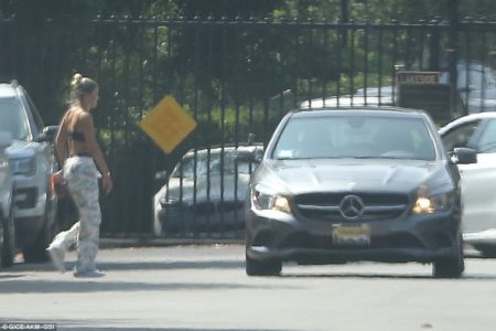 370F36AC00000578-3732609-That_s_my_ride_The_model_showed_off_her_toned_stomach_and_svelte-a-63_1470808410485