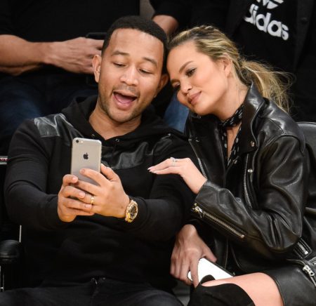 LOS ANGELES,  CA - MARCH 10: John Legend and Chrissy Teigen attend a basketball game between the Cleveland Cavaliers and the Los Angeles Lakers at Staples Center on March 10,  2016 in Los Angeles,  California. (Photo by Noel Vasquez/GC Images)