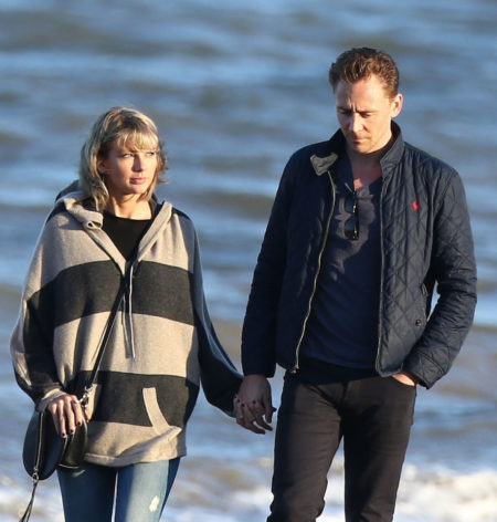 Picture Shows: Taylor Swift,  Tom Hiddleston June 25,  2016 Taylor Swift and boyfriend Tom Hiddleston go for a romantic walk along the beach in the UK. The pair were joined by Tom's mum Diana Hiddleston for the stroll in the evening sunlight. The couple were on a whirlwind tour to visit the family in the UK. Exclusive WORLDWIDE RIGHTS Pictures by : FameFlynet UK ? 2016 Tel : +44 (0)20 3551 5049 Email : info@fameflynet.uk.com