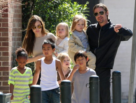 #7006830 The Jolie-Pitt family headed out in New Orleans,  Louisiana to do some grocery shopping at a local market on March 20,  2011. Angelina has brought all six children to visit their dad Brad Pitt while he works on his latest project "Cogan's Trade". Maddox,  Pax,  Zahara and Shiloh walked while the twins Knox and Vivienne hitched a ride from mom and dad who were all smiles while out and about on a lovely sunny day. Brad and Angelina waved to fans as they strolled the street to and from the market. Fame Pictures,  Inc - Santa Monica,  CA,  USA - +1 (310) 395-0500