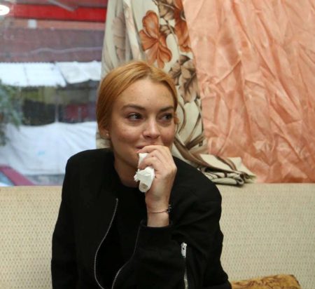 ISTANBUL,  TURKEY - SEPTEMBER 26: Hollywood actress Lindsay Lohan is seen at the house of a Syrian refugee family after the visit to a hospital built for Syrian refugees at Sultanbeyli suburb of Istanbul,  Turkey on September 26,  2016. (Photo by Stringer/Anadolu Agency/Getty Images)
