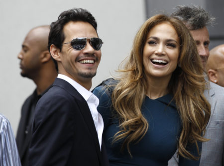 Actress Jennifer Lopez and her husband Marc Anthony attend the ceremony where producer Simon Fuller was honored with a star on the Walk of Fame in Hollywood,  California May 23,  2011. REUTERS/Mario Anzuoni (UNITED STATES - Tags: ENTERTAINMENT) - RTR2MSXO