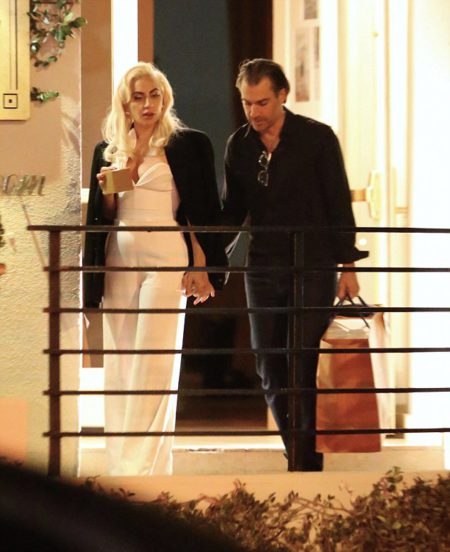 *PREMIUM EXCLUSIVE RATES APPLY* *NO WEB UNTIL 1PM PST,  MARCH 7,  2017* Lady Gaga gets intimate with her new romance and manager Christian Carino as they leave a celebrity-packed party at the Sunset Tower Hotel in West Hollywood. The loved up couple were the last to leave the party,  holding hands as they emerged at about 4am. Gaga had Christian?s jacket draped around her as they kissed passionately while waiting at the valet. Other stars at the party included Lilly Collns,  Jessica Alba,  Dylan Mcdermott,  Tommy Hilfiger,  and Christina Aguilera