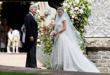Pippa Middleton arrives with her father Michael Middleton for her wedding to James Matthews at St Mark's Church in Englefield,  England Saturday,  May 20,  2017. Middleton,  the sister of Kate,  Duchess of Cambridge is to marry hedge fund manager James Matthews in a ceremony Saturday where her niece and nephew Prince George and Princess Charlotte are in the wedding party,  along with sister Kate and princes Harry and William. (AP Photo/Kirsty Wigglesworth,  Pool)