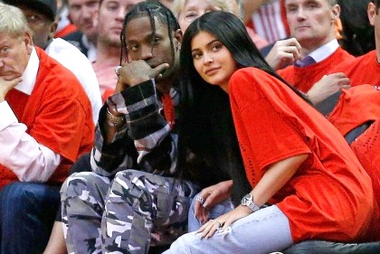 HOUSTON,  TX - APRIL 25: Houston rapper Travis Scott and Kylie Jenner watch courtside during Game Five of the Western Conference Quarterfinals game of the 2017 NBA Playoffs at Toyota Center on April 25,  2017 in Houston,  Texas. NOTE TO USER: User expressly acknowledges and agrees that,  by downloading and/or using this photograph,  user is consenting to the terms and conditions of the Getty Images License Agreement. (Photo by Bob Levey/Getty Images)